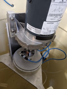 test setup with strain gauge mounted between motor and thrust bearing