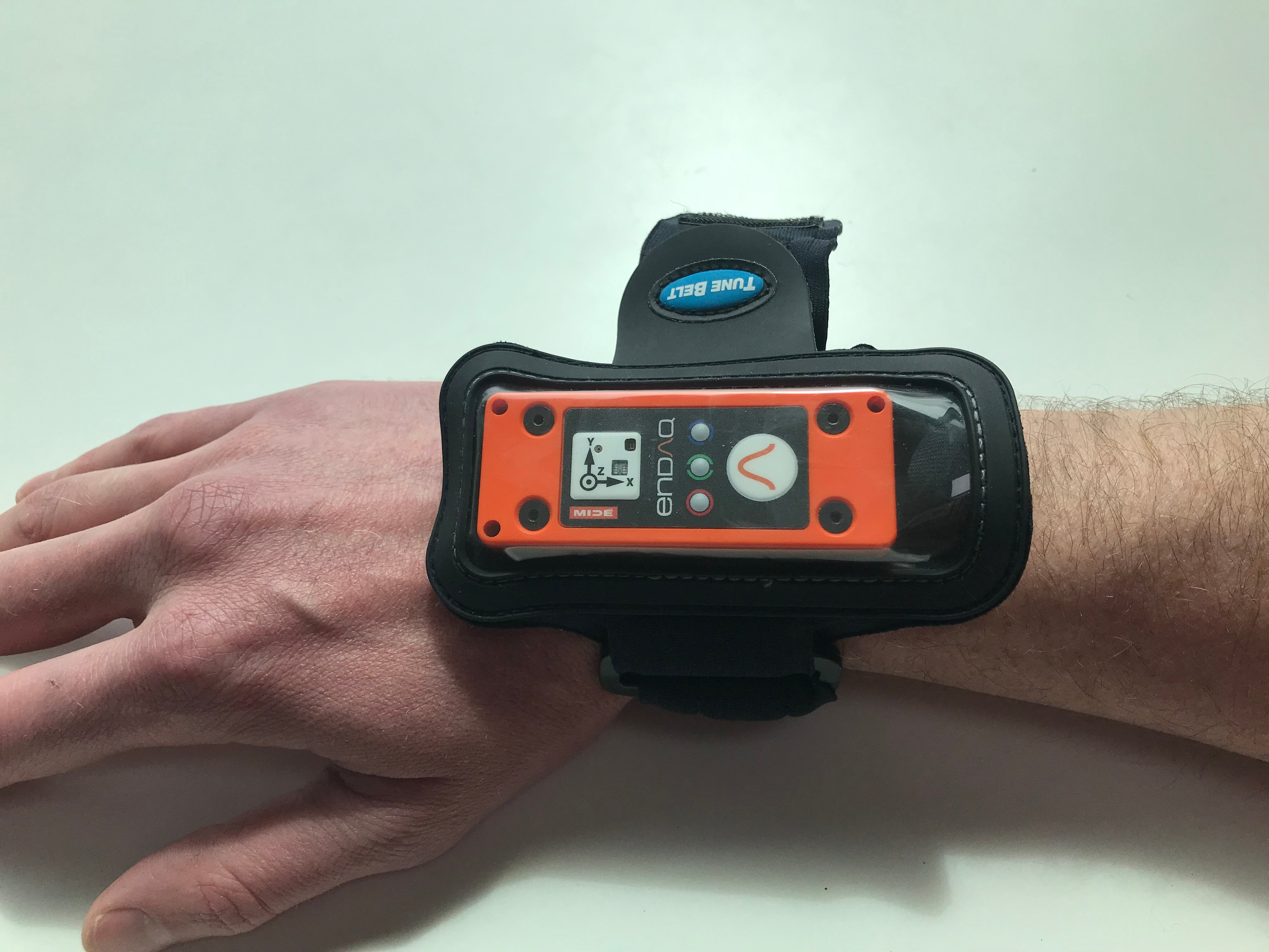 enDAQ sensor attached to wrist to gather shock and vibration data